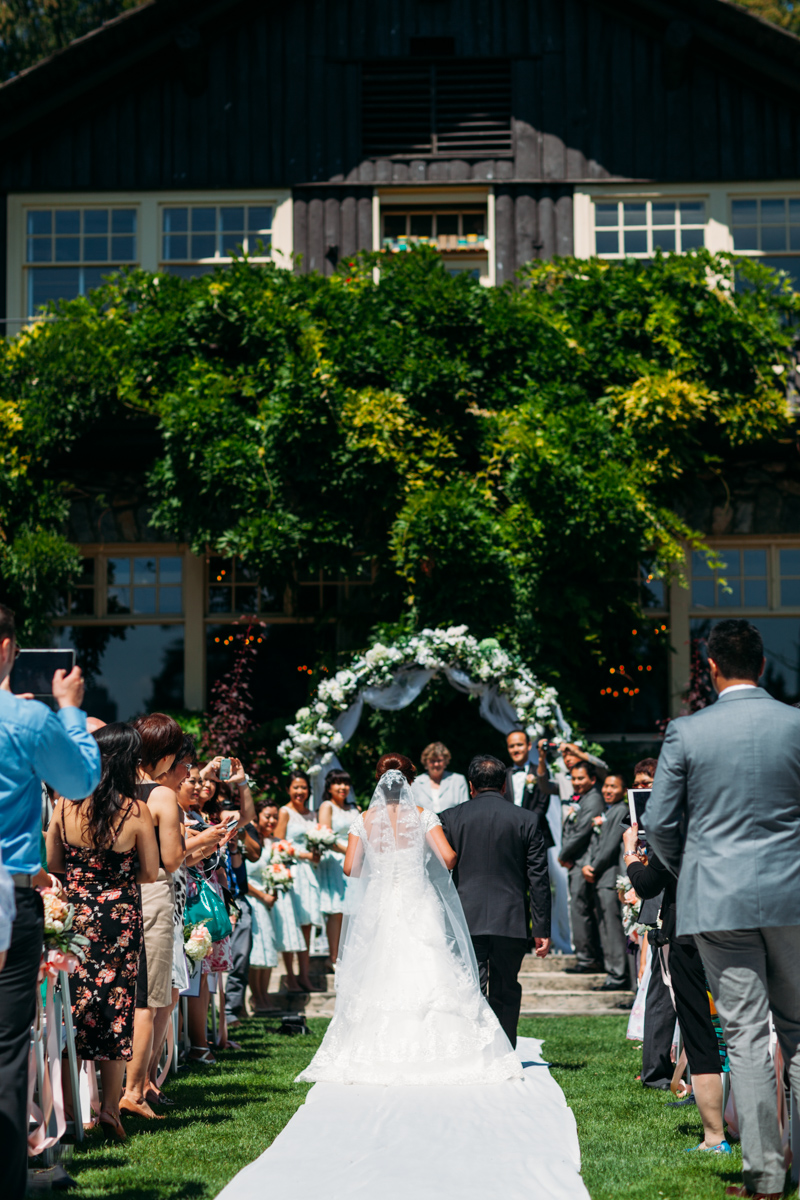 Bride walking down the aisle in the ceremony