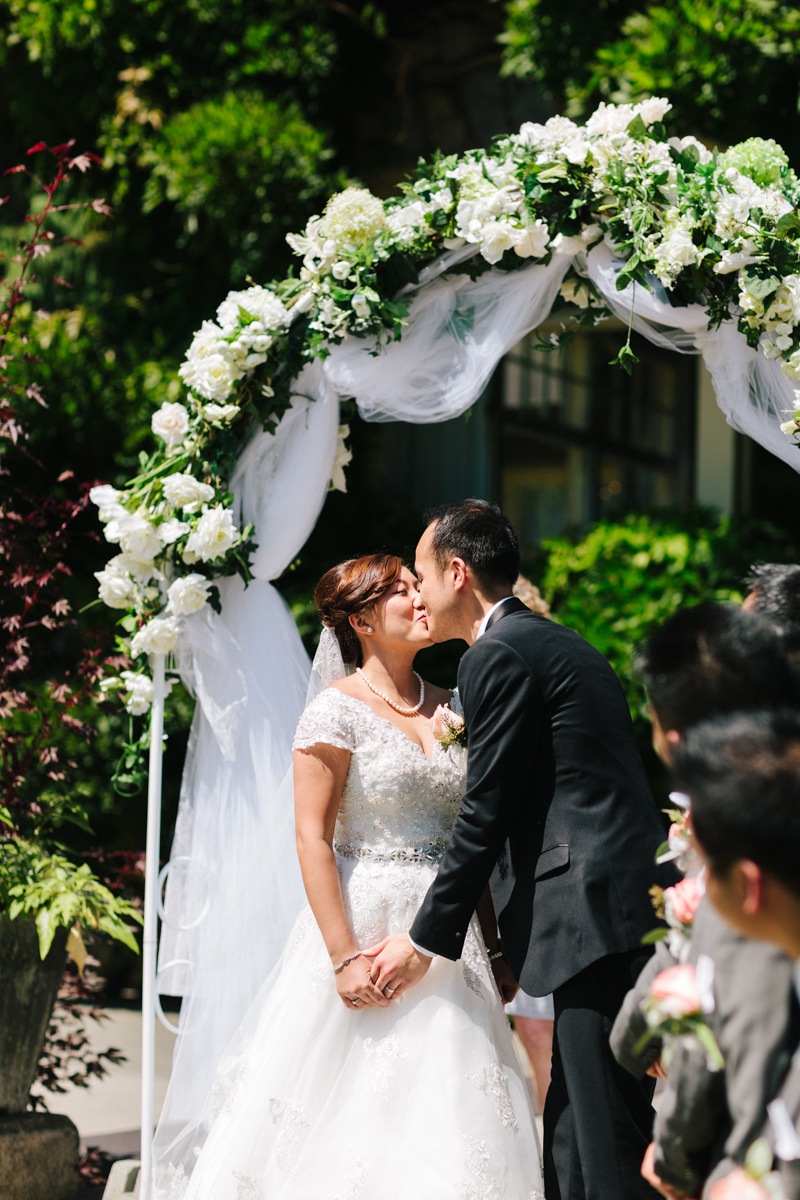 First kiss of the bride and groom (Stanley Park Pavilion)
