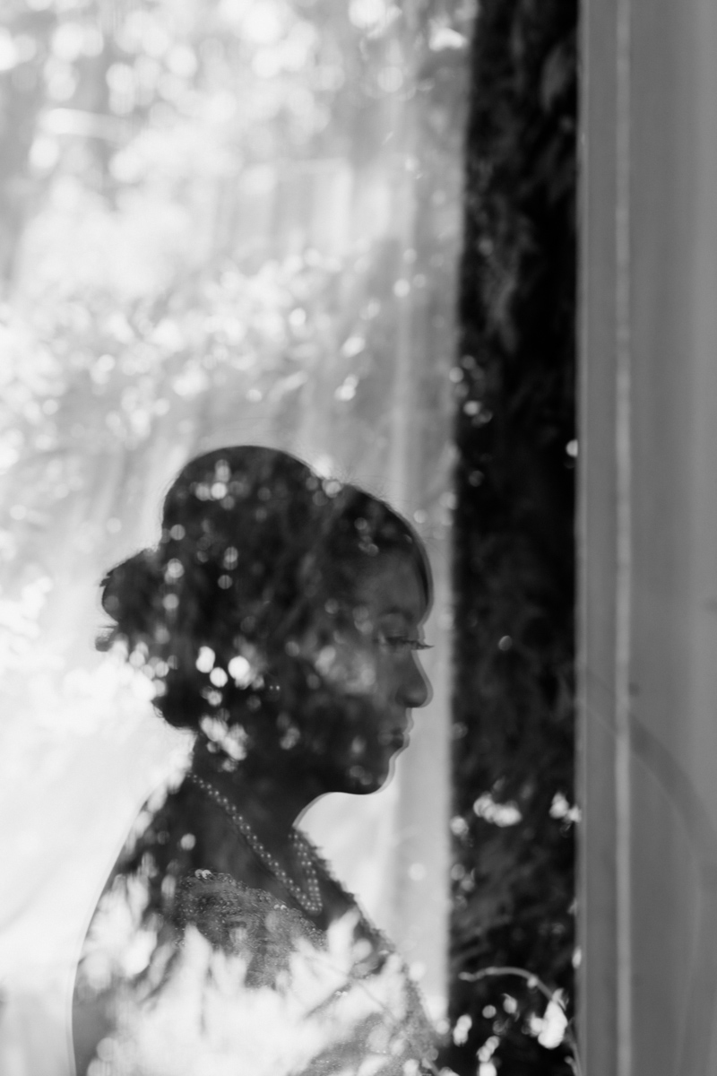 Black and White shot of bride reflection